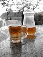 cold beer in a mug and a jug