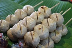 delicious meat balls on sticks for party