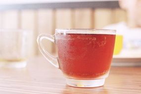 cup of black tea on the table