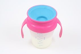 colorful Sippy Cup with milk