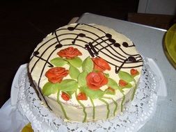 cake with flowers and musical notes