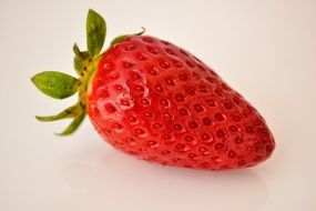 ripe strawberries on a white table