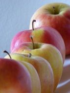 five Red Apples in row