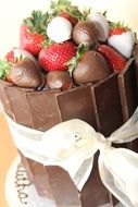 chocolate cake with strawberries and sweets