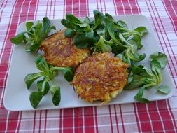 Plate with vegetables and greenery