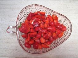 chopped strawberries in a transparent bowl