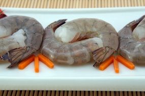 royal shrimp with carrot sticks