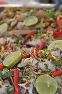 Thai street food with lime and hot pepper