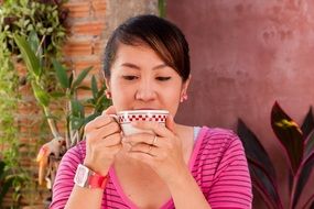 Lady drinks Coffee