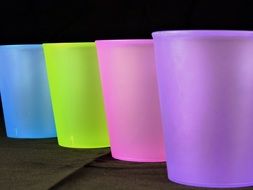 Colorful Glasses in Row, dark background