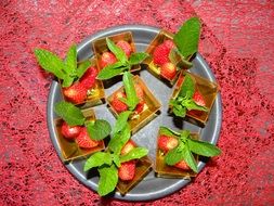dessert with strawberries and mint