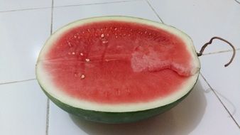 sliced watermelon on a white table