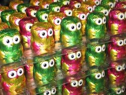 chocolate owls in colored wrappers