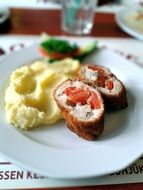 turkey with potatoes on a plate