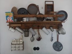 kitchen utensils on the shelves