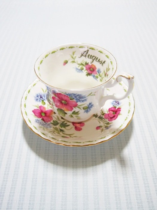 tea cup with painted spring flowers