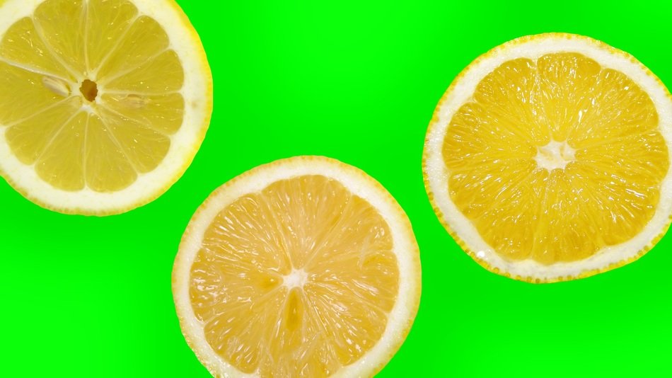 green background with lemon slices
