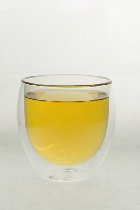 Delicious yellow tea in a glass