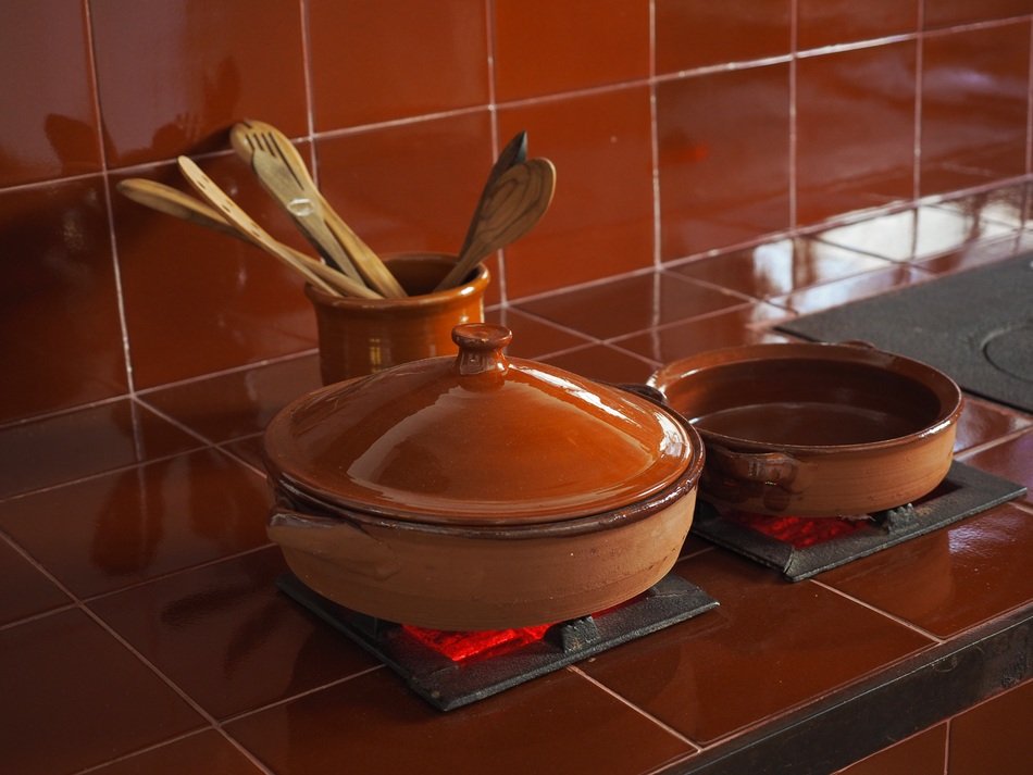 Sausepan is on the stove in kitchen