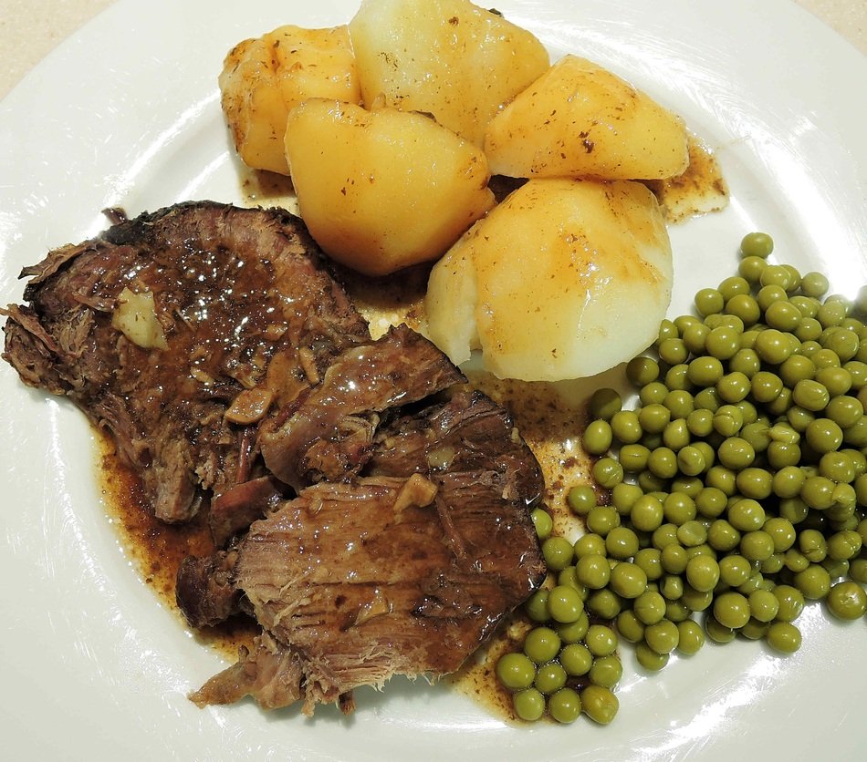 Sirloin Beef with Roast Potatoes and peas