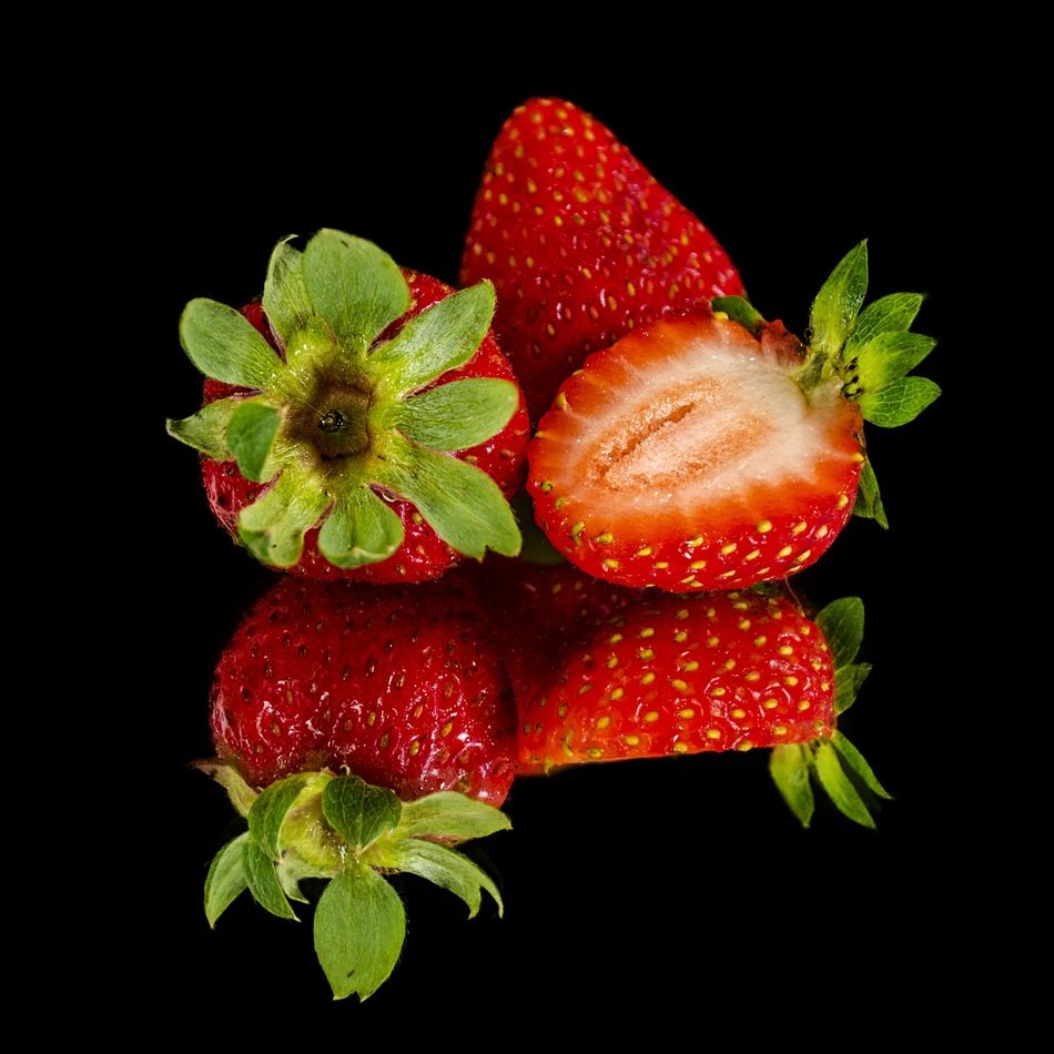 strawberries on the black background