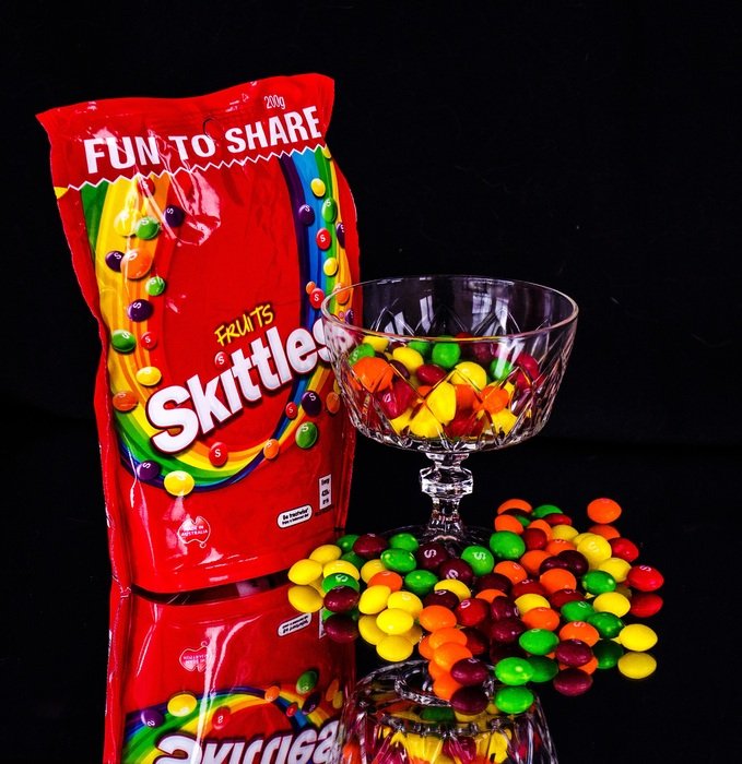 skittles on the black background