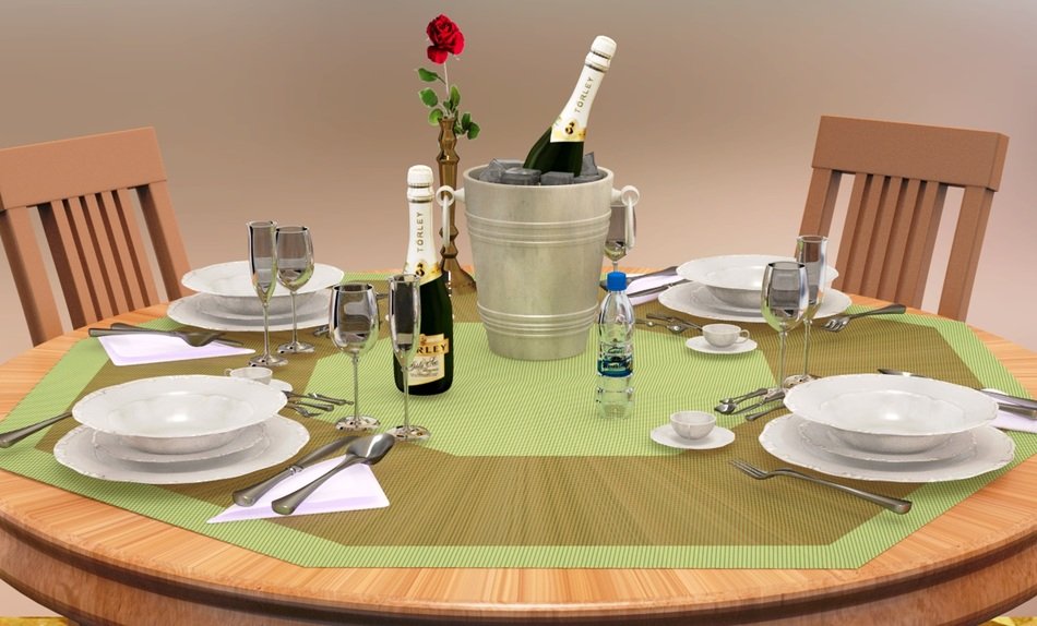 served dinner table with champagne