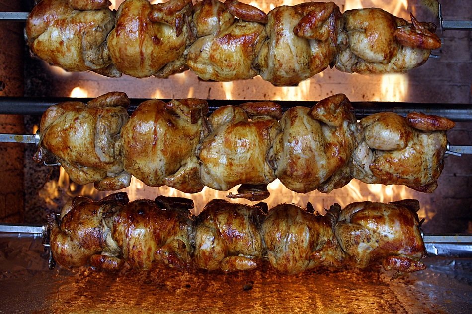 appetizing Chickens Roasting on skewers