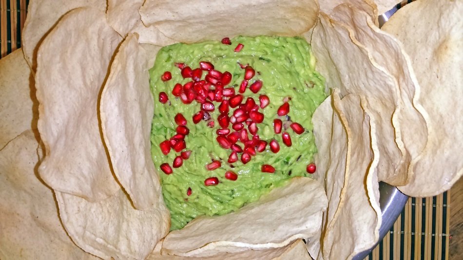 guacamole with pomegranate in tortillas