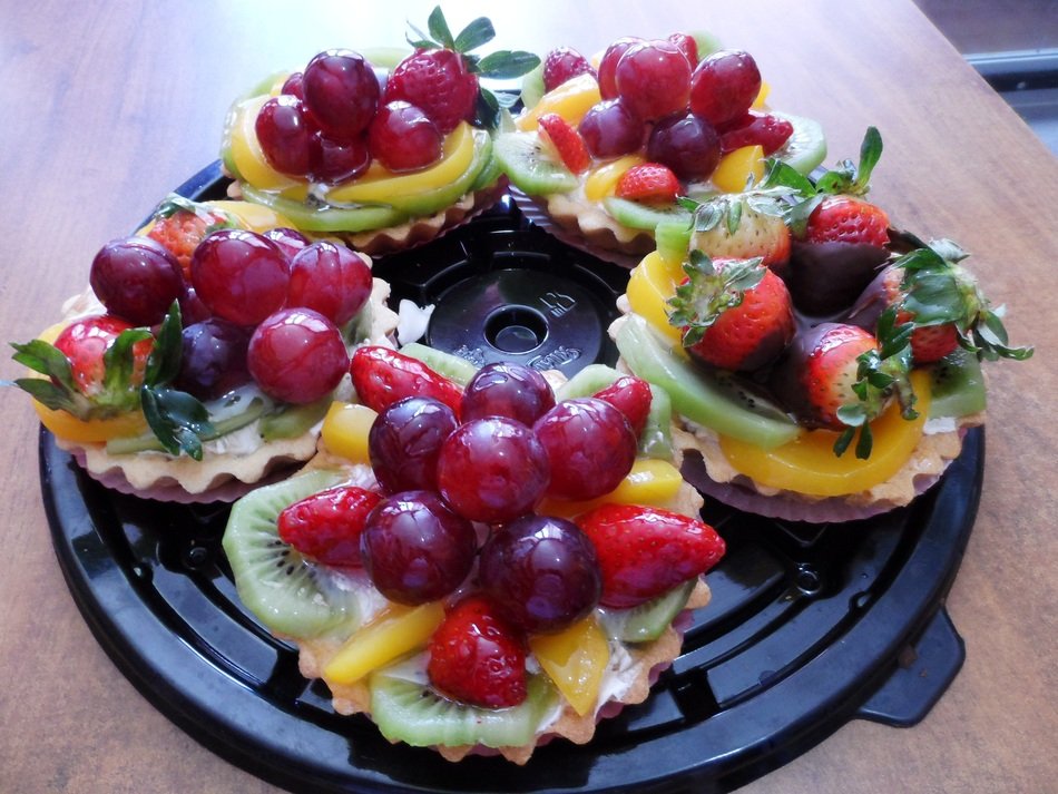 sweet tartlets with berries for dessert