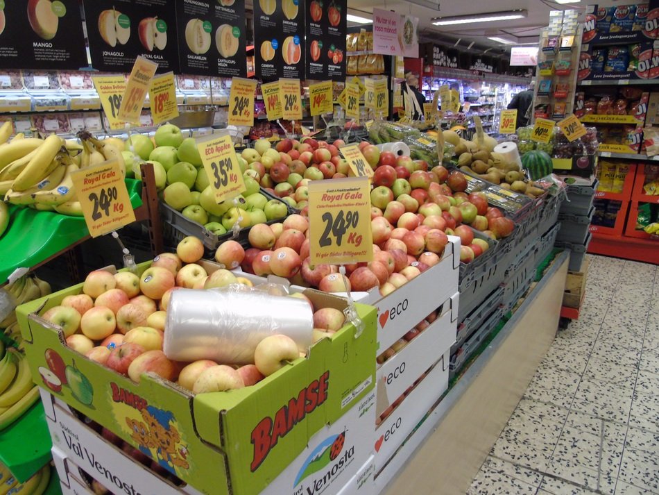 vegetables in large boxes in the supermarket