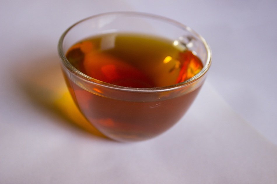 Red tea in the cup