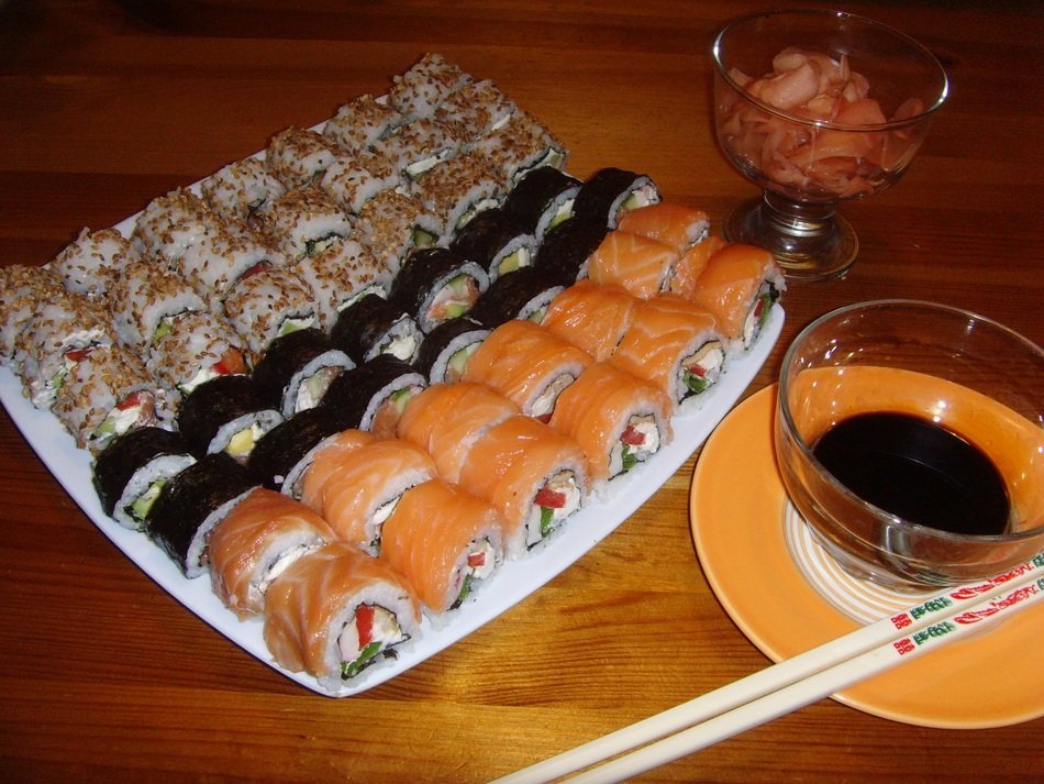 Sushi set and sauce on table