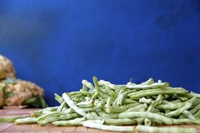 green beans on a wooden table