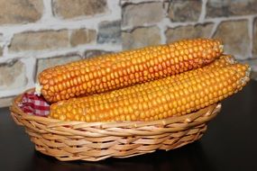 Corns in small basket in the kitchen