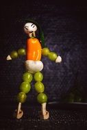 little man made of fruits and vegetables