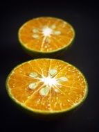 citrus slices on black