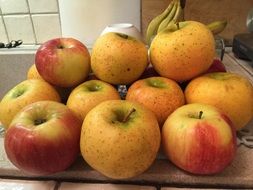 ripe apples on the kitchen table