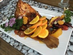 fried fish with oranges