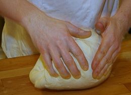 kneading the dough by hands