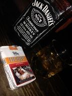 whiskey jack daniels and a pack of cigarettes