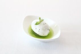 Tiny ice cream with mint