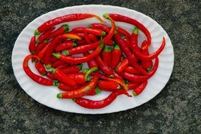 chili peppers on the white plate