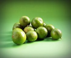 green limes on the green background