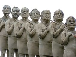 men sculptures by Peter Lenk