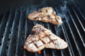 Grilled steak on a barbecue