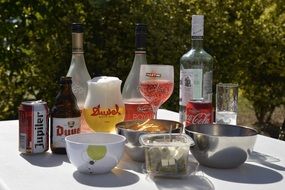 wine, beer, coca-cola and martini on the table