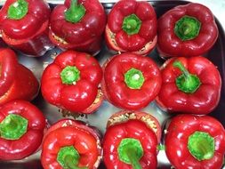 stuffed red bell peppers on pan