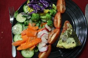 colorful Vegetables on black plate