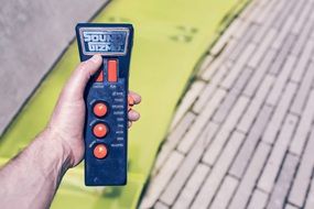 control panel in hand